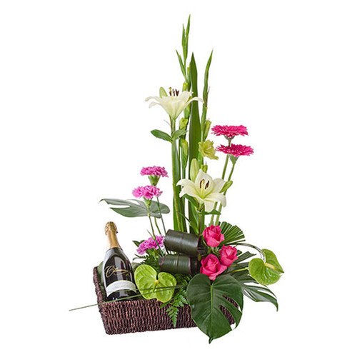 Vibrant display of flowers and a bottle of sparkling wine