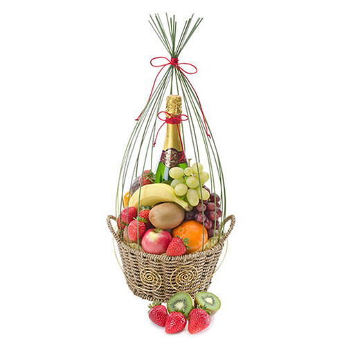 Seasonal fruit in a basket with a bottle of Australian bubbly